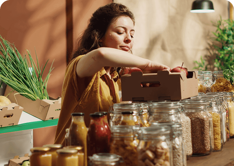 Grocery worker packing items